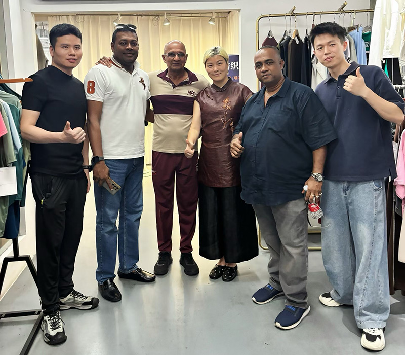Custom Clothing Manufacturer overseas clients visiting and inspecting our garment factory